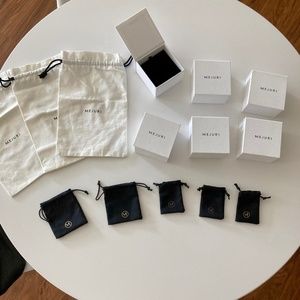 Mejuri cloth bags, boxes and small jewelry bags